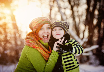 Family in winter time having fun