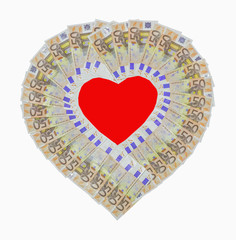 Geld oder Liebe? Rotes Herz von 50 Euro Banknoten umrahmt