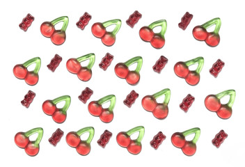 Gymmy bear and cherry candy pattern on a white background