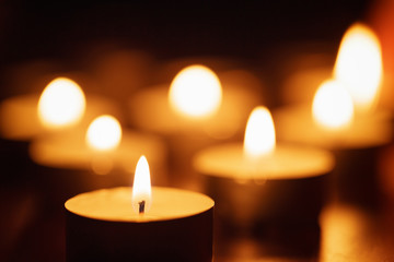 burning candles with beautiful out of focus