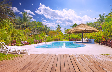 Resort swimming pool with empty plank board