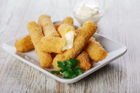 Fototapeta fried mozzarella cheese sticks breaded