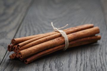 bunch of cinnamon sticks tied with twine