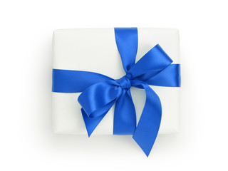 white gift box with blue ribbon bow, from above