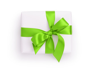 white gift box with green ribbon bow, from above