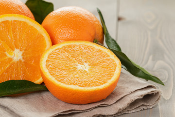 ripe spanish oranges on wood table