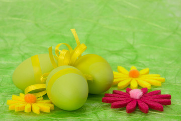 Easter background. Easter eggs and flowers.