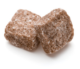 Brown lump cane sugar cube isolated on white background cutout