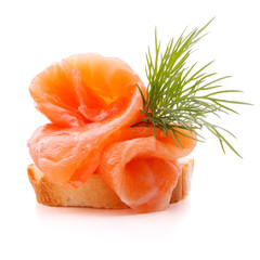 sandwich or canape with salmon on white background  cutout