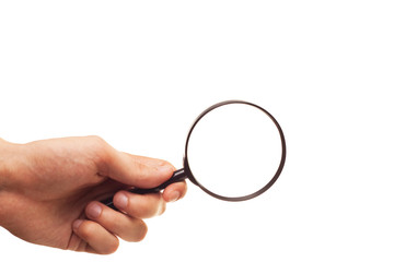 hand with magnifying glass isolated on white background