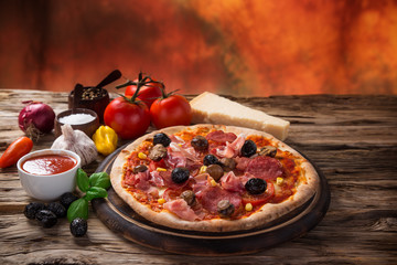 Delicious italian pizza served on wooden table