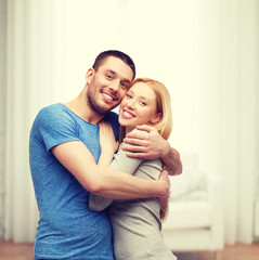 Fototapeta premium smiling couple hugging