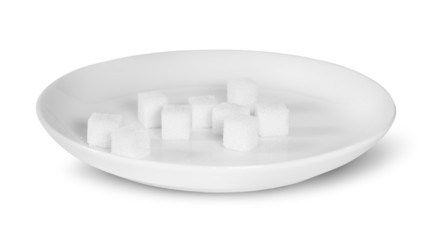 Sugar Cubes On A White Plate