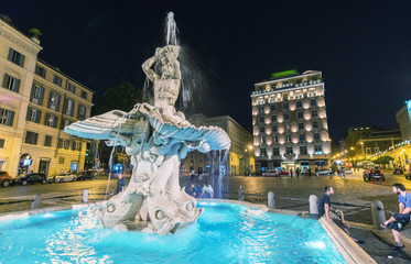 Fototapeta premium ROME - MAY 23, 2014: Tourists walk in Piazza del Tritone. More t