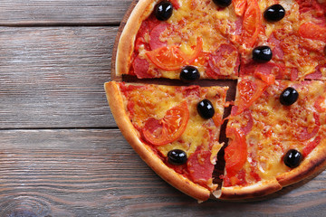 Delicious Italian pizza with black olives