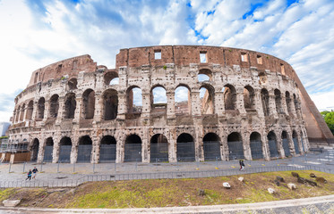 Fototapeta na wymiar Stunning view of Colosseum in Rome against blue sky