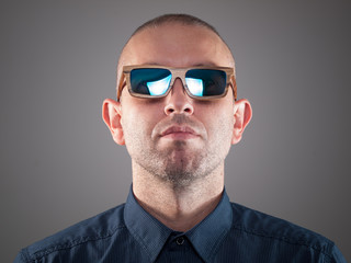 Man with sunglasses in a studio shot