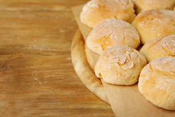 Fototapeta na wymiar Fresh homemade bread buns from yeast dough