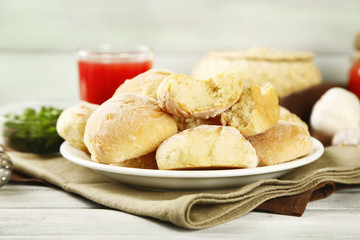 Fresh homemade bread buns from yeast dough with fresh garlic