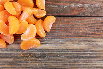 Tangerines on wooden background