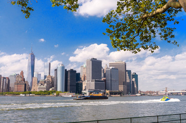 Beautiful Lower Manhattan skyline framed by trees