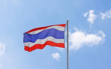 Fototapeta na wymiar Flag of Thailand waving with blue sky