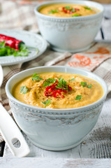 Carrot cream soup with red chili pepper