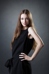 Portrait of long-haired model posing at camera