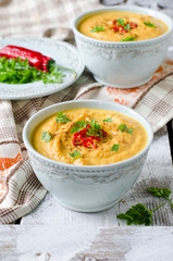Carrot cream soup with red chili pepper