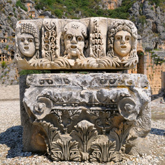 masks and Lycian tombs in the Myra, Turkey