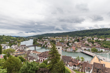 Fototapeta na wymiar View of Schaffhausen old town and the Rhine river on a cloudy da