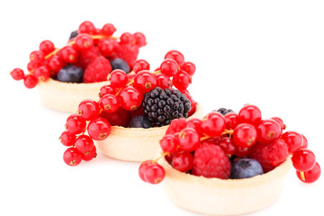Fresh ripe berries in tartlets
