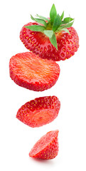 Falling strawberry isolated on white