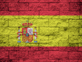 Spain, Spanish flag on wall textured background