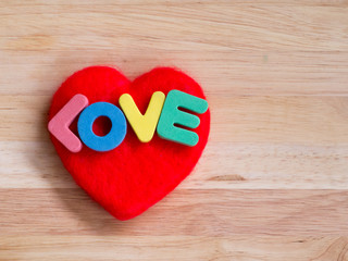 Valentines Day background red heart on wooden background