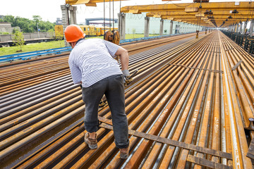 worker working in Steel pipes on the rack