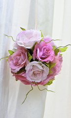 Bouquet ball decoration with white satin background