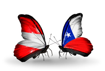 Two butterflies with flags Austria and Chile