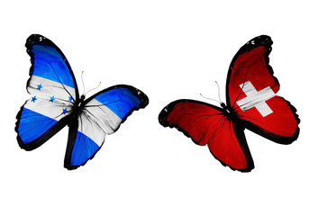 Concept - two butterflies with Honduras and Switzerland flags