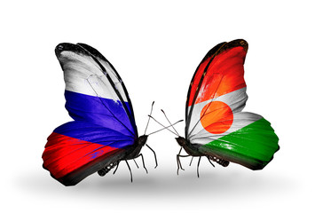 Two butterflies with flags Russia and Niger
