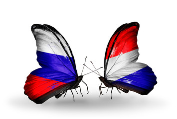 Two butterflies with flags Russia and Holland