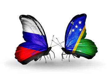 Two butterflies with flags Russia and Solomon Islands