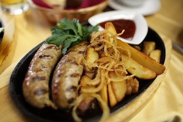 Sausages with roasted potatoes