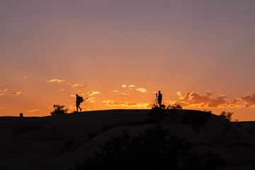 Fototapeta premium Photographers in the Sunset