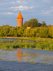 Obraz premium Round tower at the river