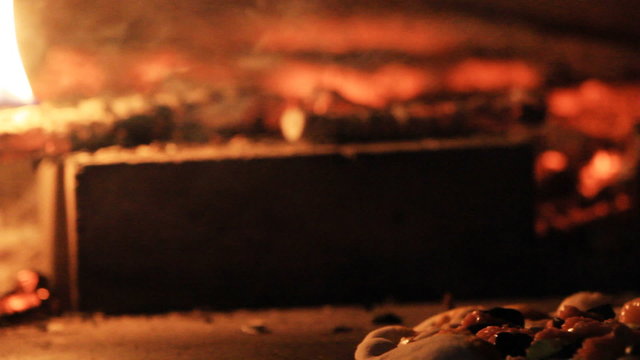 Pizza in a wood fire oven