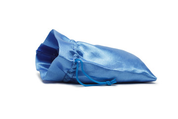 opened blue christmas bag with present isolated over white backg