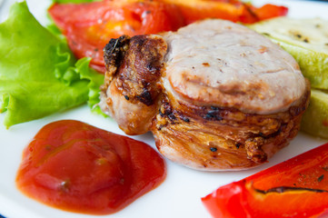roasted pork steak with grilled vegetables