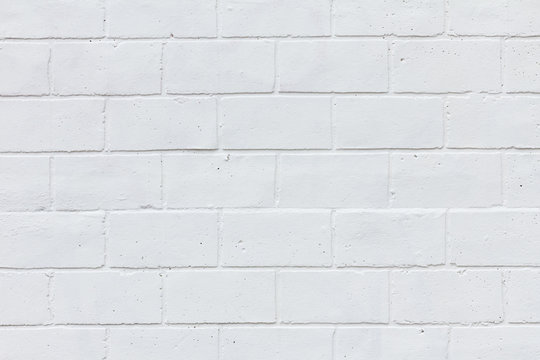 Painted white brick wall texture background