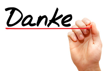 Hand writing Danke with marker, business concept